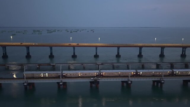 Aerial Night View of Train Crossing Pamban Bridge in Rameswaram Tamil Nadu India