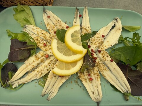 Marinated White Anchovy Fillets with Lemon Slices and Peppercorns