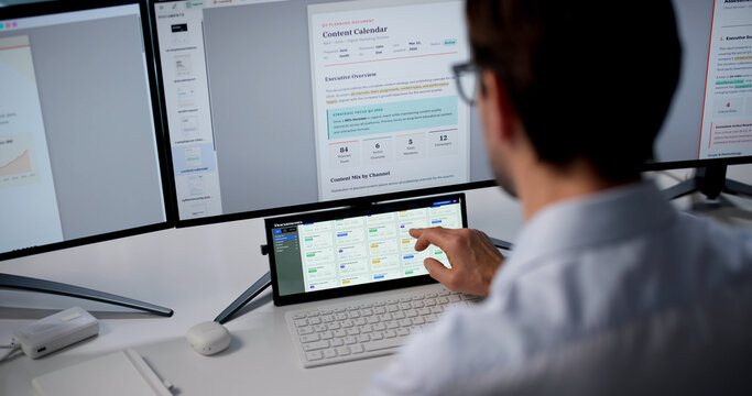 Man Uses Touchscreen Monitors To Organize Documents