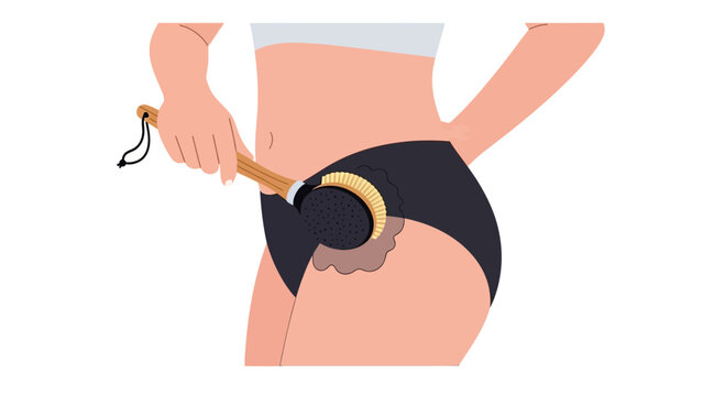 Woman dry brushing her hip and thigh with a natural bristle brush for exfoliation