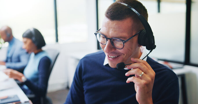 Consulting, man and smile with headset in call center for inbound assistance, loan advice or CRM. Coworking, finance agent and happy with mic for insurance claim, online inquiry and customer support
