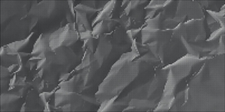 Crinkled gray paper texture fills the frame with a chaotic pattern