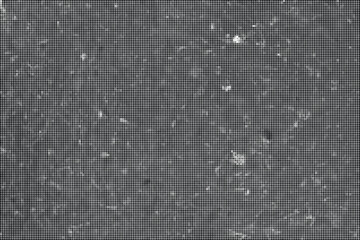 Fototapeta premium A close-up view of a gray marble surface with white specks and a seamless transparent background texture