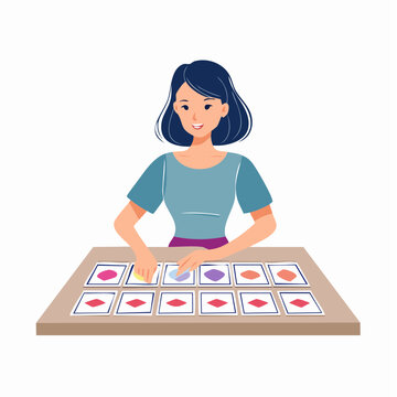 Woman playing a memory matching game with cards