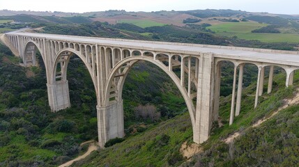 Fototapeta premium Bridge architectural evolution historic concrete arch viaduct spanning California canyon with distinctive Art Deco styling and engineering excellence