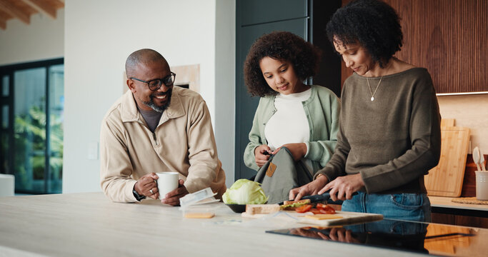 Parents, daughter and meal prep in kitchen with backpack, healthy food and getting ready for school. Happy people, mother and father in home with girl child, sandwich or morning routine for education