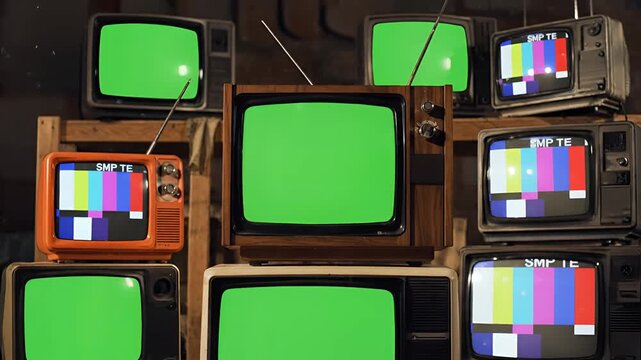 Vintage Television Set Collection With Green Screen and Test Patterns.