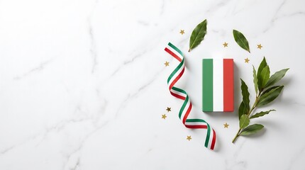Italian flag gift box with striped ribbon and bay leaves on white marble background top view