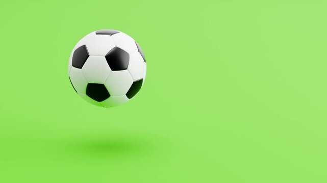 Soccer Ball Spinning and Floating on Green Background with Copy Space, Seamless Loop 3D Animation