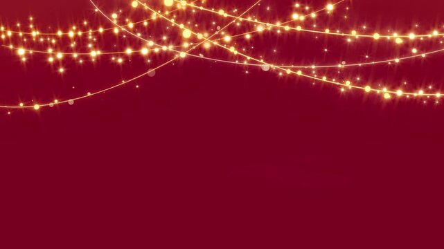 Golden glowing string lights hanging and twinkling against a deep red background creating a warm festive holiday atmosphere loop