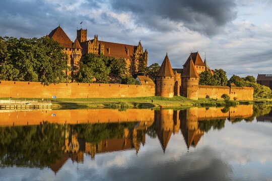 Unesco world heritage sight Malbork castle at sunset, Malbork, Poland