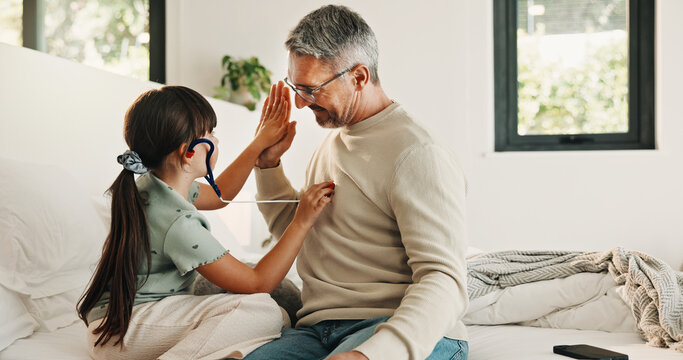 Child, high five and stethoscope with father in home for good news, pretend doctor and bonding. Man, daughter and medical tools for fantasy checkup, healthcare role play and celebration for treatment