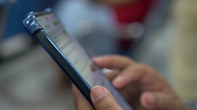 Investors People using Mobile phones online shoping trading gold, Gold investment on application