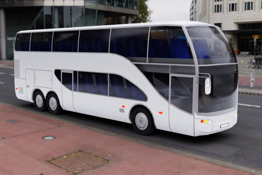 Un autobus a due piani con un'elegante carrozzeria bianca transita in una strada cittadina. &Egrave; dotato di ampi finestrini e vetri oscurati. L'autobus ha un design moderno con linee pulite.