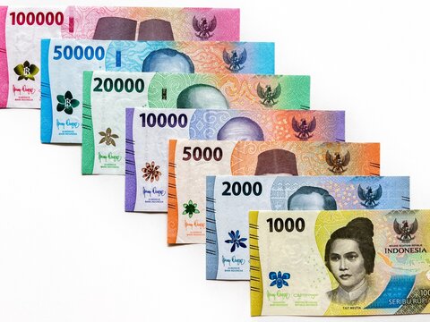 A set of Indonesian rupiah banknotes of various denominations, demonstrating the currency's diversity and design. Concept of finance and economics.