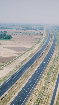 Aerial view of the Ganga Expressway, a modern highway under construction in Uttar Pradesh, India