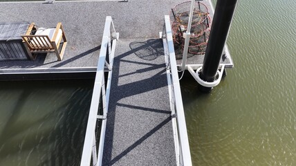 Aerial View of a Gangway Leading to a Private Floating Dock © blueringmedia