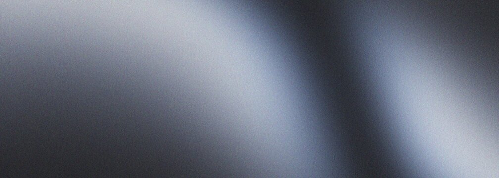 Sleek silver metallic surface reflecting soft beams of cool light creating industrial aesthetic with subtle grainy texture perfect for high end professional designs.