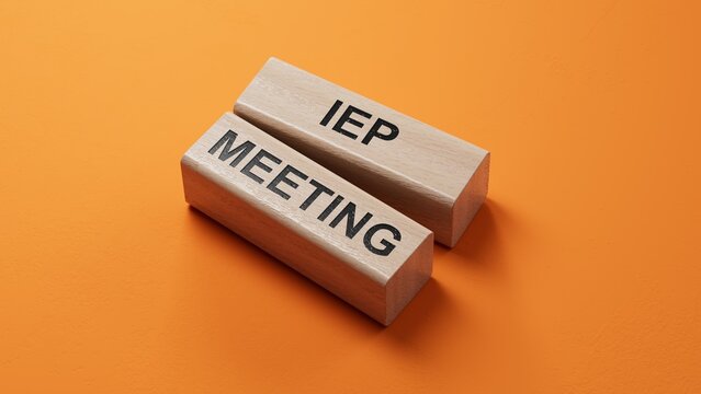 IEP MEETING word written on wooden block. wooden blocks. Copy space.3D rendering