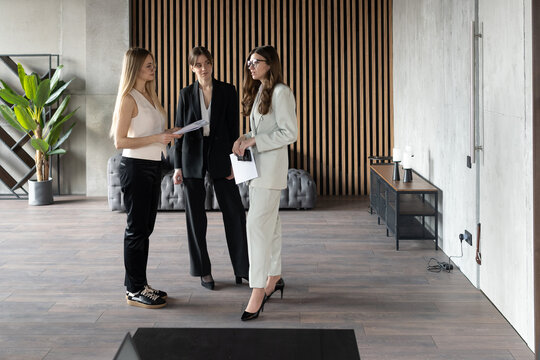 Female lawyers or legal team discussing case documents