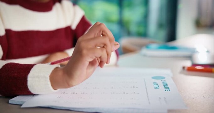 Education, hands and child writing on paper for math homework, equation solution and knowledge. Answer, student and numeracy assignment in home for problem solving, learning assessment or development