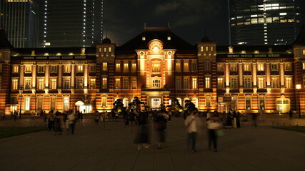 Grand historic building facade in a modern illuminated city square © Hikaru Okazaki