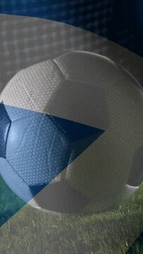 Vertical video: On broadcast cue overlay sweeping across soccer ball, revealing pitch for sports