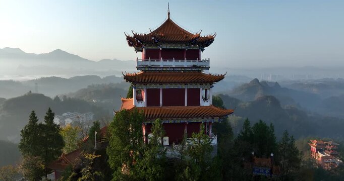 Sunrise and ancient chinese buddha temple landscape in Hunan province,China