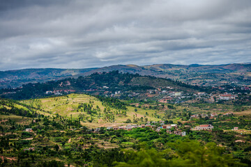 Fototapeta premium Hilly landscape with rural houses and agricultural terraces on the outskirts of Antananarivo