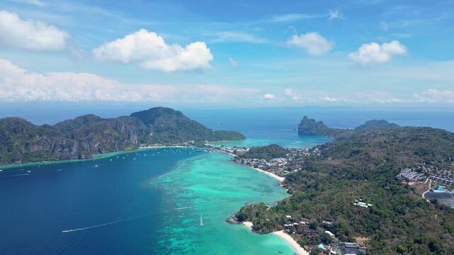 Phi Phi Island, Thailand : Aerial drone footage of Ko Phi Phi, famous island in Andaman sea of Thailand with turquoise water and white sand beach. Taken with orbit motion