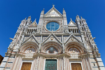 Fototapeta premium Siena Cathedral, begun in the 12th century, is a masterpiece of Italian Romanesque–Gothic architecture