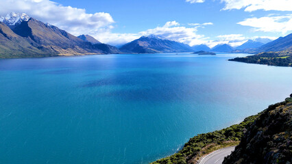 High Angle View of Turquoise Lake Wakatipu and Snow Capped Mountains