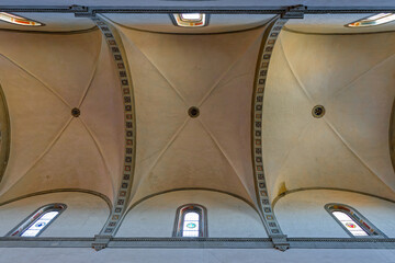 Fototapeta premium SIENA, ITALY, April 25, 2026 : Roofs of San Clemente in Santa Maria dei Servi basilica
