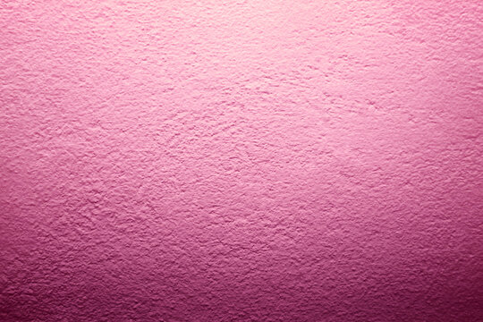 Pink concrete wall texture soft top glow rough surface abstract background material pastel pattern minimal backdrop design vibrant detail vintage