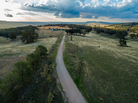 Farm driveway in soft light at the end of the day in country Australia
