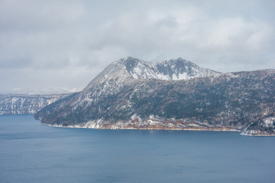 The natural view from the Mashu lake observation desk is covered in snow in winter in Hokkaido.