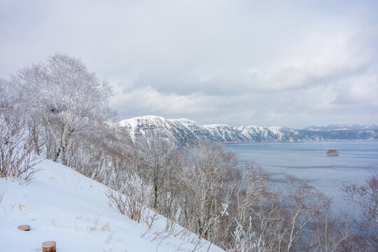 The natural view from the Mashu lake observation desk is covered in snow in winter in Hokkaido.