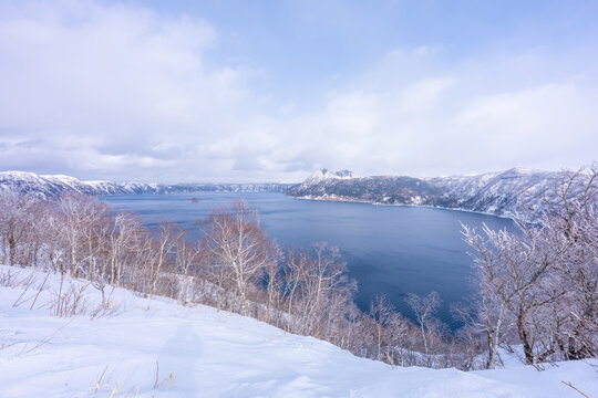 The natural view from the Mashu lake observation desk is covered in snow in winter in Hokkaido.