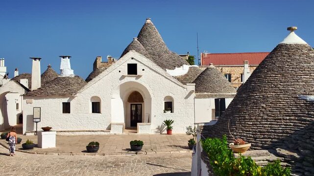 Beautiful Trullo Sovrano at sunny day in Alberobello, Puglia, Italy