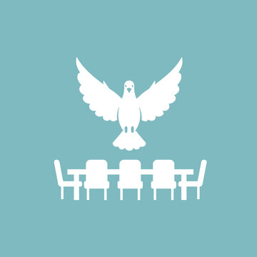 White dove on a conference table.