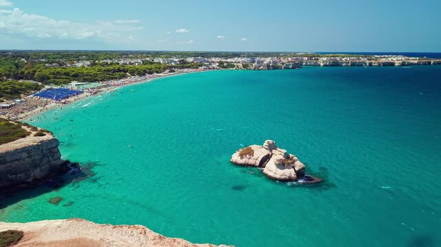 Aerial view of Le Due Sorelle sea stacks in Torre dell Orso, Puglia, Italy