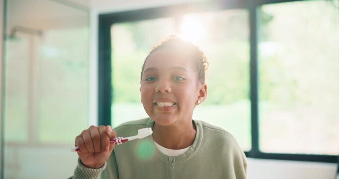 Dental, face or kid in house with toothbrush, cavity prevention or oral care in child growth. POV, flare or girl in bathroom with tool, bacteria reduction or hygiene routine in childhood development.