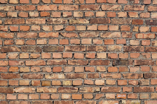 Orange background, photo of orange brick wall texture