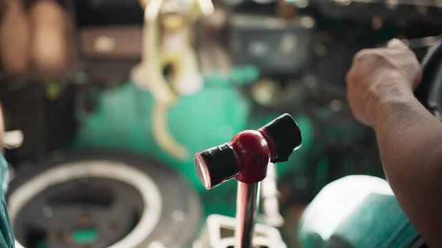 Close-Up of Hand Shifting Gear Lever in Public Minibus