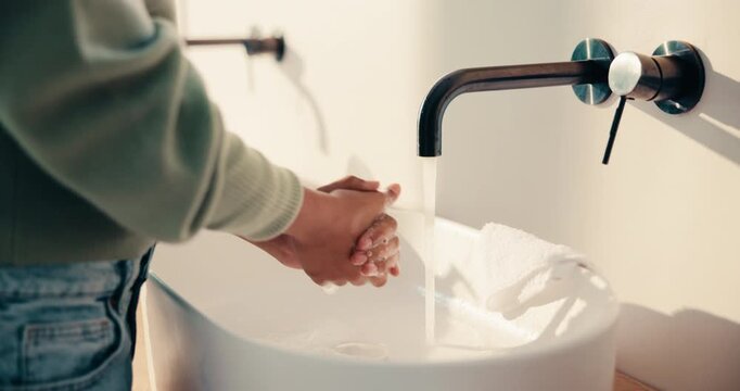 Health, washing hands or person in house with soap, bacteria removal or sanitation in wellness routine. Safety, clean or woman with disinfectant, germ protection or hygiene habit in virus prevention.