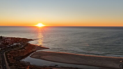 Obraz premium Port Noarlunga Beach and South Port Beach, Southern Adelaide, South Australia – 4K Aerial Drone View of Golden Sunset, Onkaparinga River Mouth, Beachfront Houses, Coastline and Ocean Views