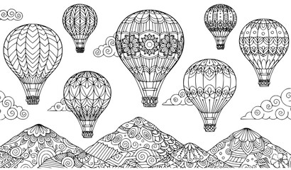 Zentangle hot air balloons above mountains and clouds coloring book vector illustration © Romjan