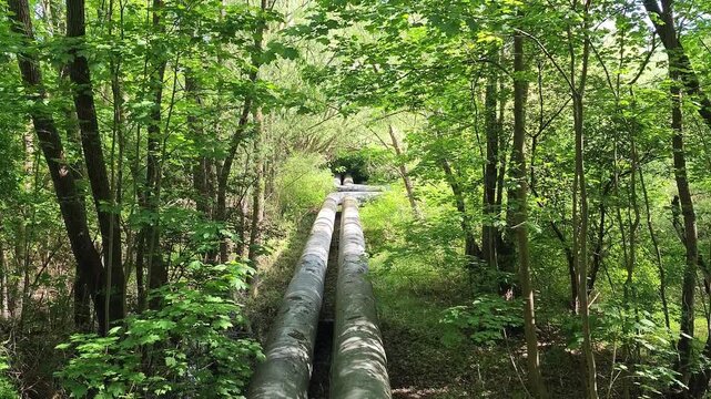 Overground heat pipes. Pipeline above the earth conducting heat for heating city