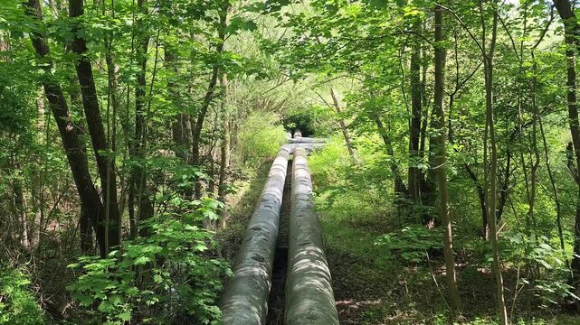 Overground heat pipes. Pipeline above the earth conducting heat for heating city