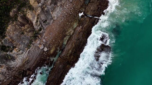 Waves aerial tilt to sky at Great Ocean road of Australia Victoria coast scenic view.